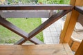 Close-up of the fence on the porch of the terrace, view from the inside. blurred summer garden background Royalty Free Stock Photo