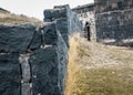 Close up fence stone wall surface with cement on yard concept photo Royalty Free Stock Photo