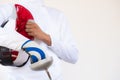 Close-up of a fencer in white fencing suit