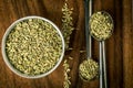 Close up fennel seed in spoon on brown wooden table Royalty Free Stock Photo