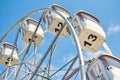 Close up ferris wheel against blue cloudy sky Royalty Free Stock Photo
