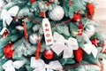 Close up festive decorated christmas tree with colorful bright toys. Royalty Free Stock Photo