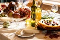 Close-up festive decorated table with roasted turkey and holiday traditional food, dishes. Happy Thanksgiving day Royalty Free Stock Photo