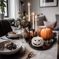 Close up festive table in small cozy dining room or restaurant decorated for Halloween. Royalty Free Stock Photo