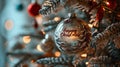 Close up of Festively Decorated Outdoor Christmas tree with bright red balls on blurred sparkling fairy background. Defocused Royalty Free Stock Photo