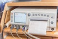 Close-up fetal monitor with baby heart beats at labor room hospital