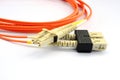 Close up of a fiber optic patchcord head over white background