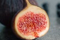 Close-up, fig fruit on a blurred dark background. Royalty Free Stock Photo