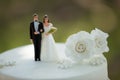 Close-up of figurine couple on wedding cake Royalty Free Stock Photo