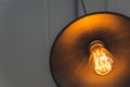 Filament inside warm light bulb Royalty Free Stock Photo