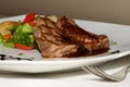 Close-up of filet mignon steak with vegetables