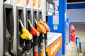 Close-up of filling handles of a fuel pump at a gas station. Royalty Free Stock Photo