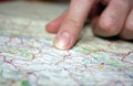 Close-up of finger on map Royalty Free Stock Photo