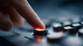 Close-up of finger pressing illuminated button on control panel with blurred background and cool lighting Royalty Free Stock Photo
