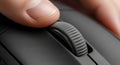 Close-up of Finger Scrolling on Computer Mouse Wheel Royalty Free Stock Photo