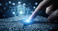 Close-up of a finger touching a glowing futuristic digital interface with intricate circuits and light effects symbolizing Royalty Free Stock Photo