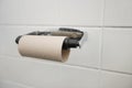 Close-up of finished toilet paper roll in bathroom Royalty Free Stock Photo