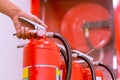 Close up Fire extinguisher and pulling pin on red tank Royalty Free Stock Photo