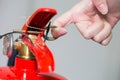 Close- up Fire extinguisher and pulling pin on red tank. Royalty Free Stock Photo