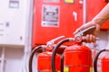 Close up Fire extinguisher and pulling pin on red tank Royalty Free Stock Photo