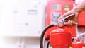 Close up Fire extinguisher and pulling pin on red tank Royalty Free Stock Photo