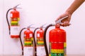 Close up Fire extinguisher and pulling pin on red tank Royalty Free Stock Photo