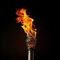 Close up fire torch vivid flames pierce the black, mesmerizingly dynamic