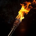 Close up fire torch vivid flames pierce the black, mesmerizingly dynamic