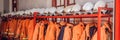 Close up of Fireman coats, helmets and boots wait for the next call. Dressing room of the volunteer fire department BANNER long fo Royalty Free Stock Photo