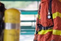 Close up fireman in fire fighting protection suit and equipment