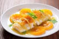 close up of fish fillet glazed with tangerine sauce