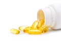 Fish oil capsules with white pill bottle. Royalty Free Stock Photo