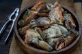 Close-up of Fish sauce-fermented Horse crab and Sea Crab Egg Pickled in Fish Sauce in wooden bowl