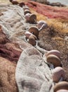 Close up of brown floats on fishing nets Royalty Free Stock Photo