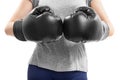 Close up of fit girl bumping fists in boxing gloves