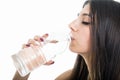 Close-up of fit girl drinking bottle of water Royalty Free Stock Photo