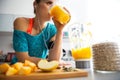 Close-up on fit woman drinking pumpkin smoothie