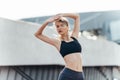 Close up of a fitness woman doing warm up exercises Royalty Free Stock Photo