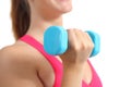 Close up of a fitness woman lifting weights exercising aerobic