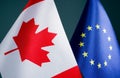 Close up of flags of Canada and EU Europe Union.