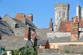 Close-up on flagstone roofs with the Victorian building Purbeck House Hotel in the background, Swanage Royalty Free Stock Photo