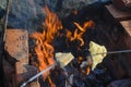 Close-up flame in a makeshift barbecue made of bricks Royalty Free Stock Photo