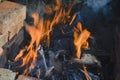 Close-up flame in a makeshift barbecue made of bricks Royalty Free Stock Photo