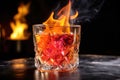 close-up of flaming cocktail with ice cubes Royalty Free Stock Photo