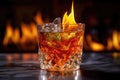 close-up of flaming cocktail with ice cubes Royalty Free Stock Photo