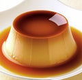 Close up of flan on white plate created using generative ai technology Royalty Free Stock Photo