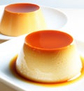 Close up of flans on white plate created using generative ai technology Royalty Free Stock Photo