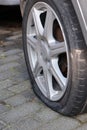 Flat car tire Royalty Free Stock Photo