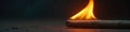 Close up of flickering flame on small wooden stick, campfire, orange, texture Royalty Free Stock Photo