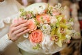 Close-up of flower arrangement of fresh orchids, roses, peonies and white lilacs